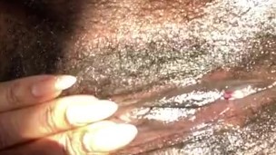 Hairy Ebony pussy gets played with