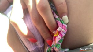 Close-up masturbating while driving in the car