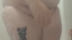 Masturbating