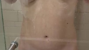 Hot blonde soaps up her big tits in shower!