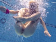 Elena Proklova shows how sexy can one be alone in the pool 13/16