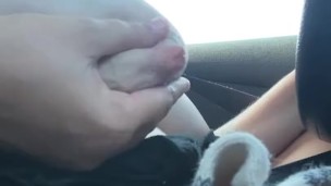 Driving while playing with engorged milky tits flashing 