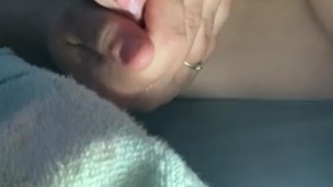 Engorged desperately hand expressing milk in tent 
