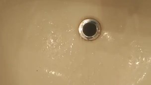 pissing all over a sub bitch hole