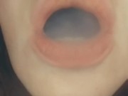 Smoking and playing with my big titties 14/16