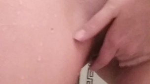 Asian girl masturbates in shower