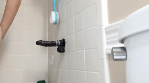 Trans girl riding dildo in the shower