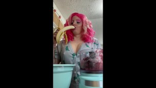 dumb bimbo shows off new kitchen gadget and new (fake) mommy milkers