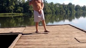 Hairy Ginger playing with dick at the river and on the dock