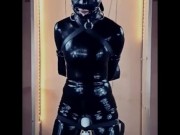 Latex doll in bondage gagged and blindfolded 2/16