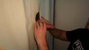 Amateur Gloryhole - A horny young jock visits the gloryhole to have his big cock worshipped by Koby