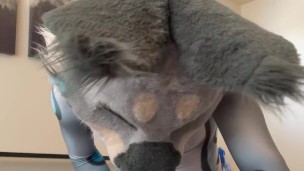 A horny lynx jerks off in his petsuit