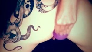 Close-up anal solo girl playing with big ass octopus tattoo