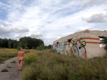 Exhibitionist Girl walks in the ruins