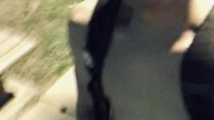Handjob while walking outside