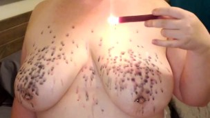 BBW drips candle wax on her tits