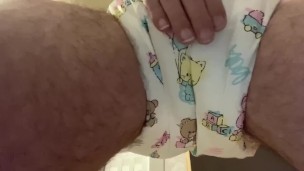 Diaper boy pees in a cute abdl diaper 