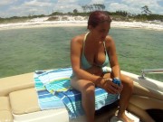 Milf in bikini flashes big tits and pussy on boat