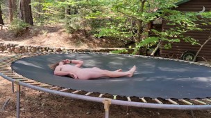 naked man jumping on a trampoline, tricks and bouncing balls