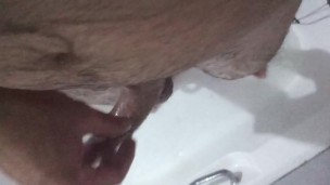 Man cleaning his dick in the shower after shaving it