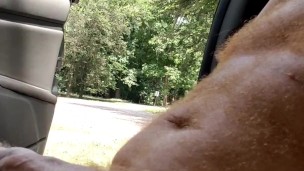Naked hairy ginger playing with dick while a guy watches and a guy passes on a motorcycle