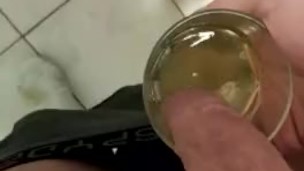 Boy drinks his own piss