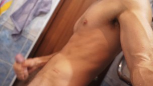 Sporty stud milking his cock secretly after morning routine workout