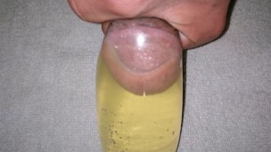 Filling condom with piss