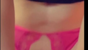 Redheaded slut rides pink dildo 