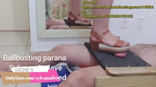 Ballbusting using plataform shoes in table