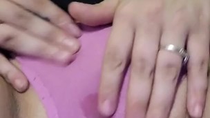 Playing with chubby wet pussy through pink panties