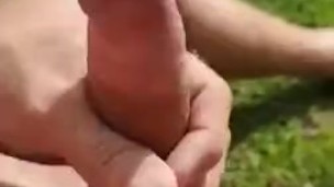 Nude sunbathing in backyard stroking my cock