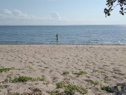 on a public beach jerking off my dick in anticipation of sex