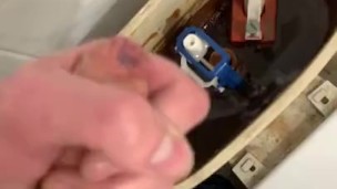 Pissing into foreskin, horny and cum in public toilet