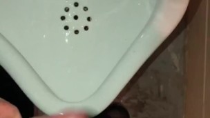 Girl Pissing into a Urinal & her Husband gets to Witness it first hand as he pisses right after her