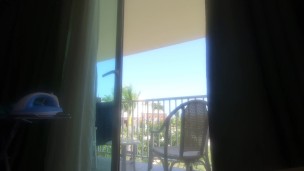 naked girl on the balcony