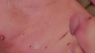 Blowing a load onto myself and grunting from the orgasm
