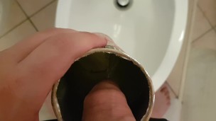Boy pisses in the tube of pringles
