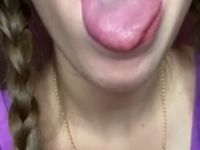 Giantess looks to tiny man before eating 13/16