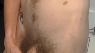 Big cock lubed up and pisses