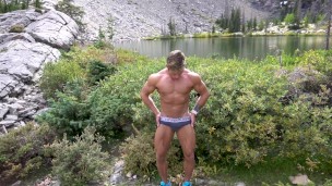 Naked Bodybuilder Posing By The Lake
