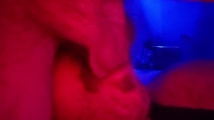 Muscle cub feeds his flat mate a big load while watching television