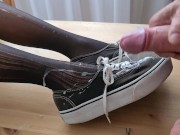 Cumming on her lovely Vans boots