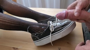 Cumming on her lovely Vans boots