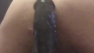 Riding Huge Black Dildo