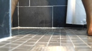 LAYING BEHIND ME WATCHING ME PEE ON THE FLOOR