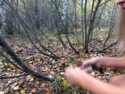 Nude Picking mushrooms in the forest