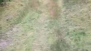 Naked tourtist plays with her pussy in a forrest