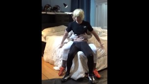 jock in white spandex having fun with dummy jock in black spandex