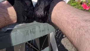 Hot feet cool down water pour wet foot and sock pull off